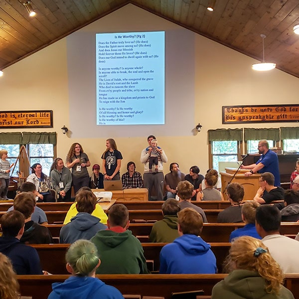 Quiz time at teen camp chapel